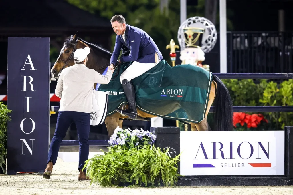 Charlie Jayne & One and Only presented as winners of the $50,000 Arion Sellier Grand Prix during ESP Holiday Finale at Wellington International. Photo © Cassidy Klein