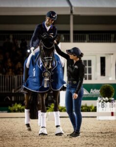Marina Lemay pats Indian Rock in the prize-giving ceremony in Wellington. Photo courtesy of Taylor Pence Media