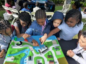 kids playing a board game outside