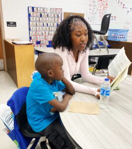 woman reading to little boy